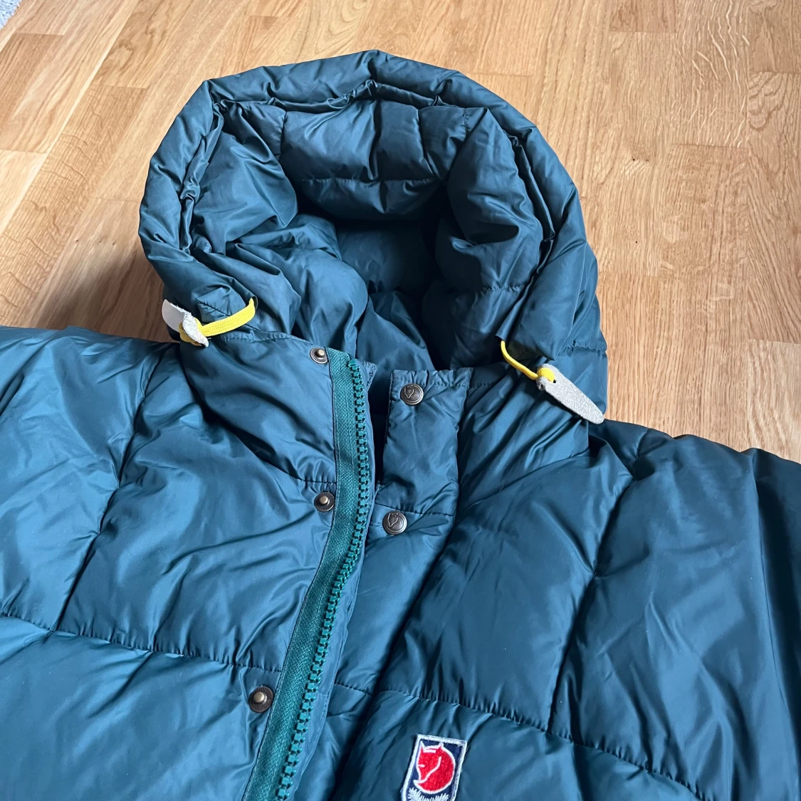 Mörkgrön dunjacka från Fjällräven  - 2