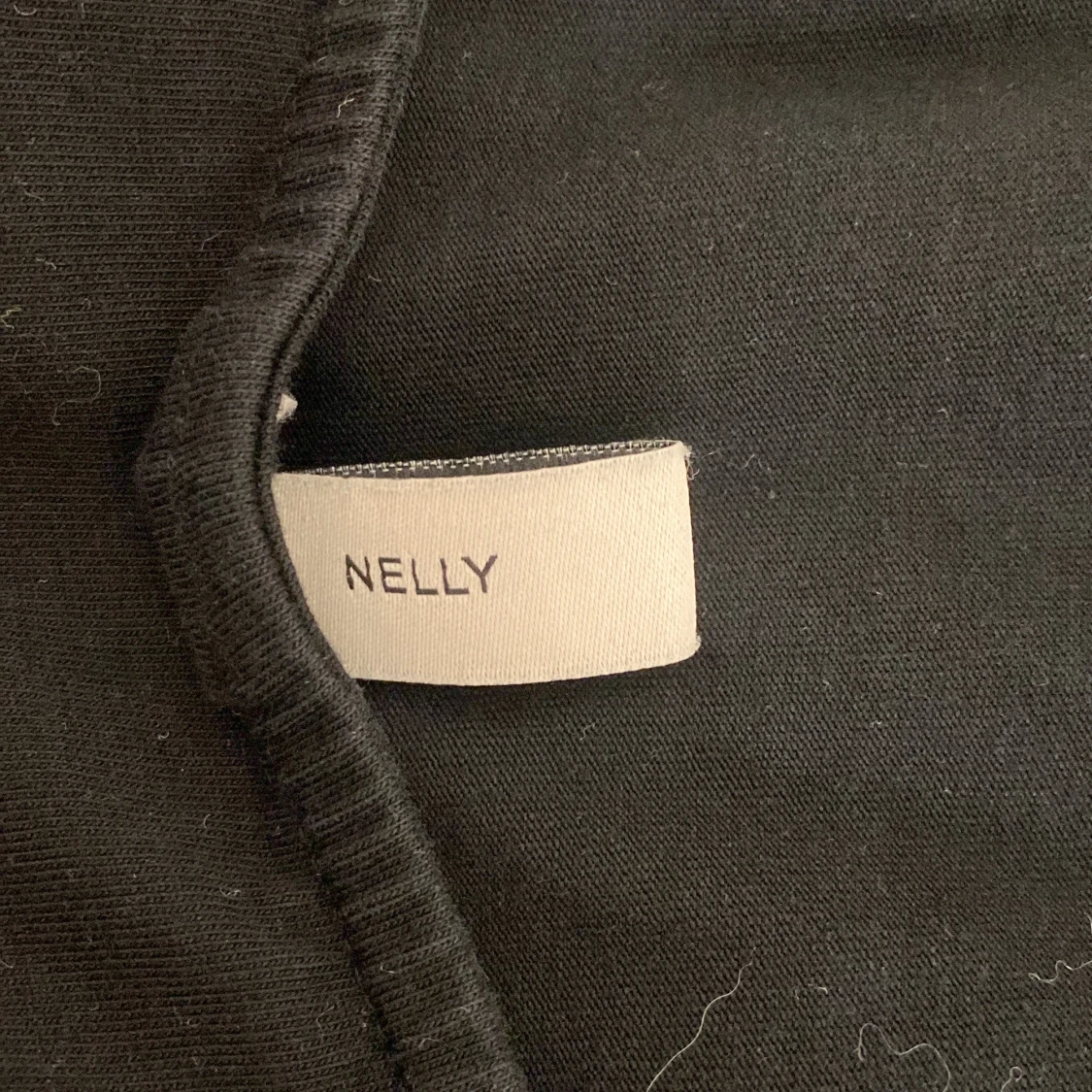 Svart topp från Nelly - 90