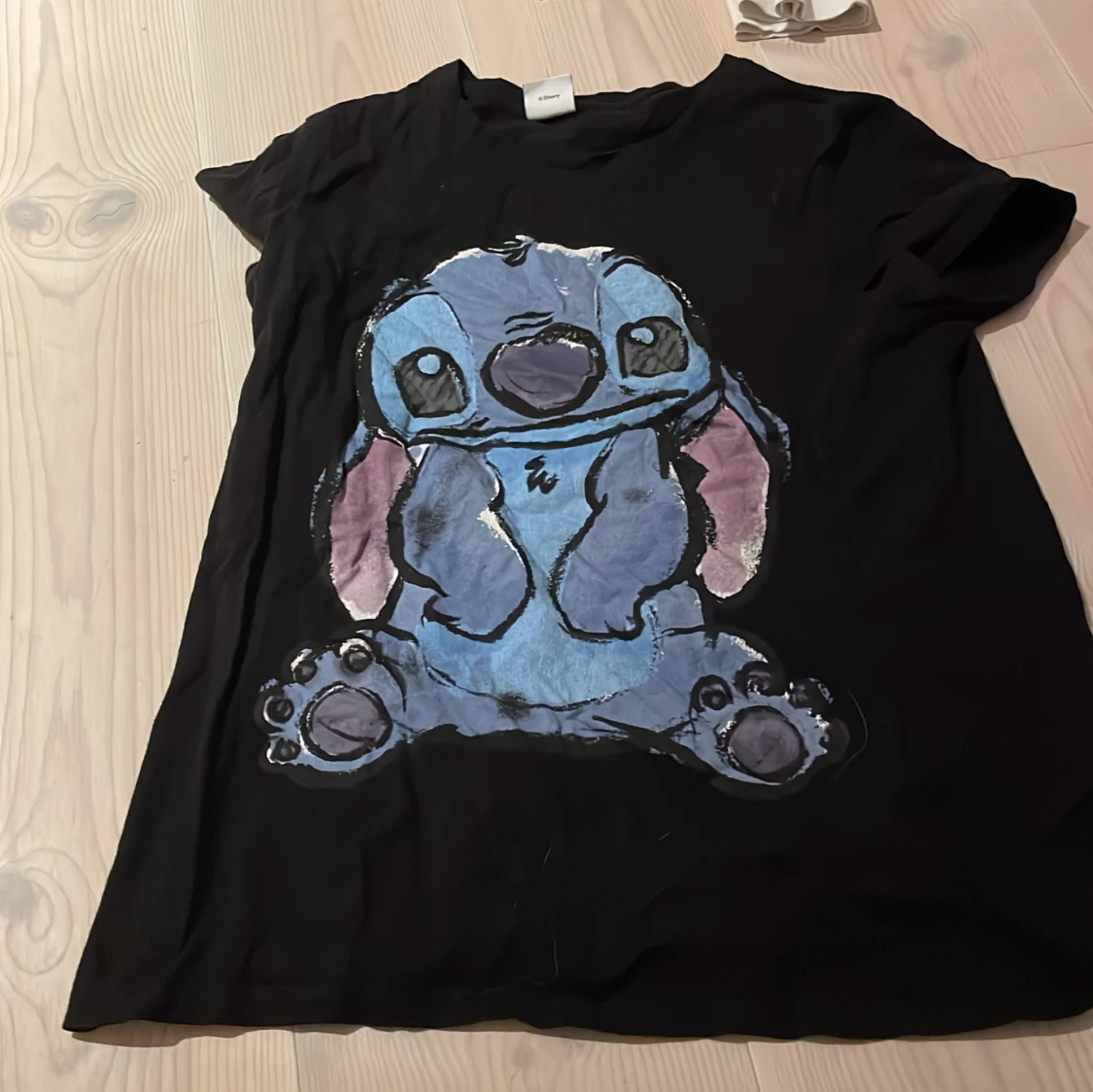 Svart t-shirt med Disney-motiv