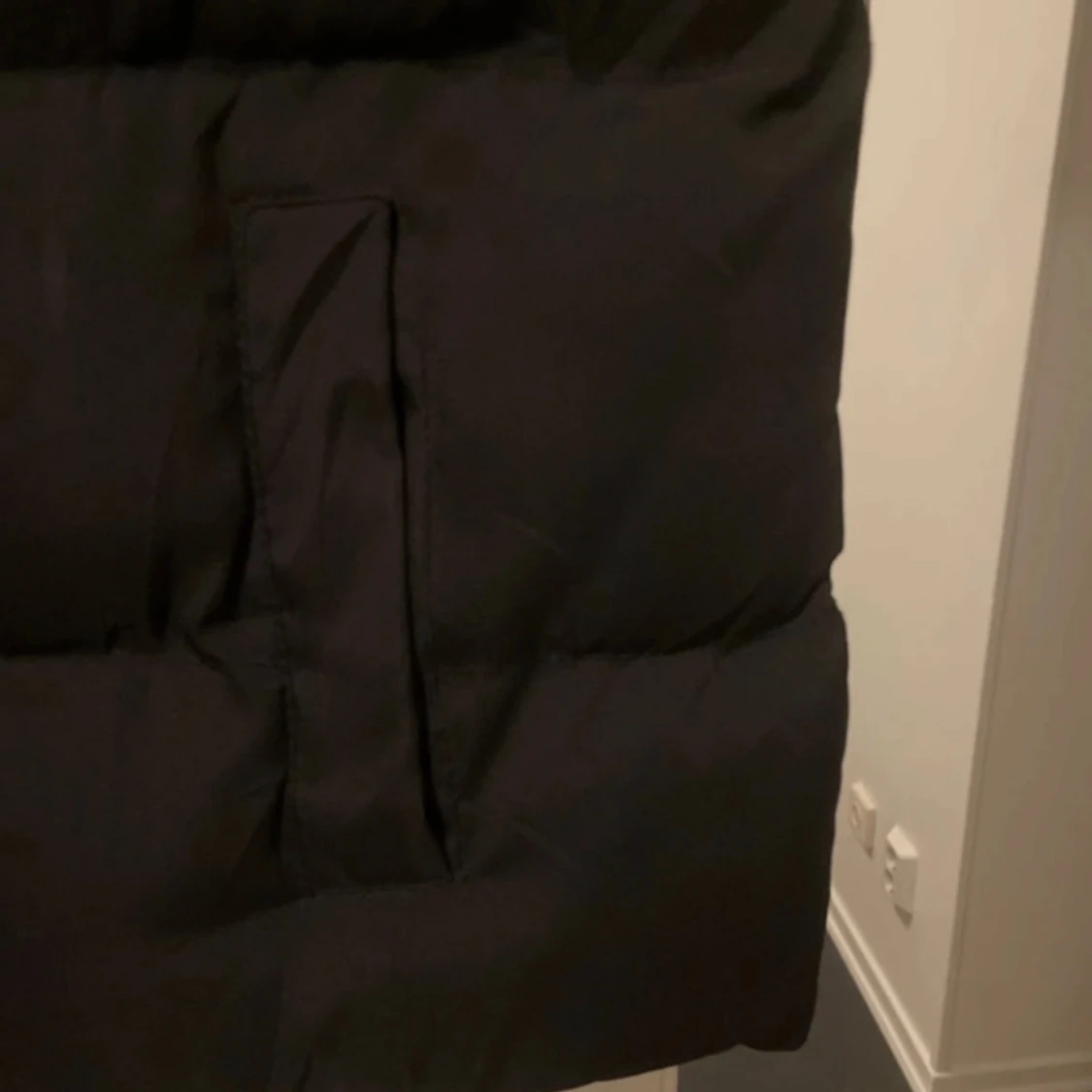 Svart dunväst från Chelsea  - 90