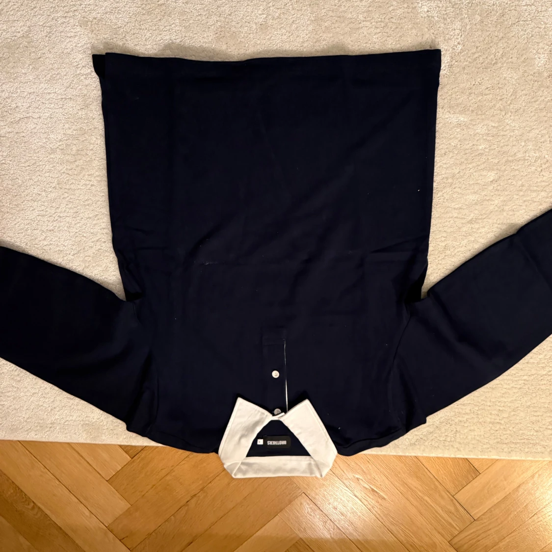 Svart pikétröja från Brothers