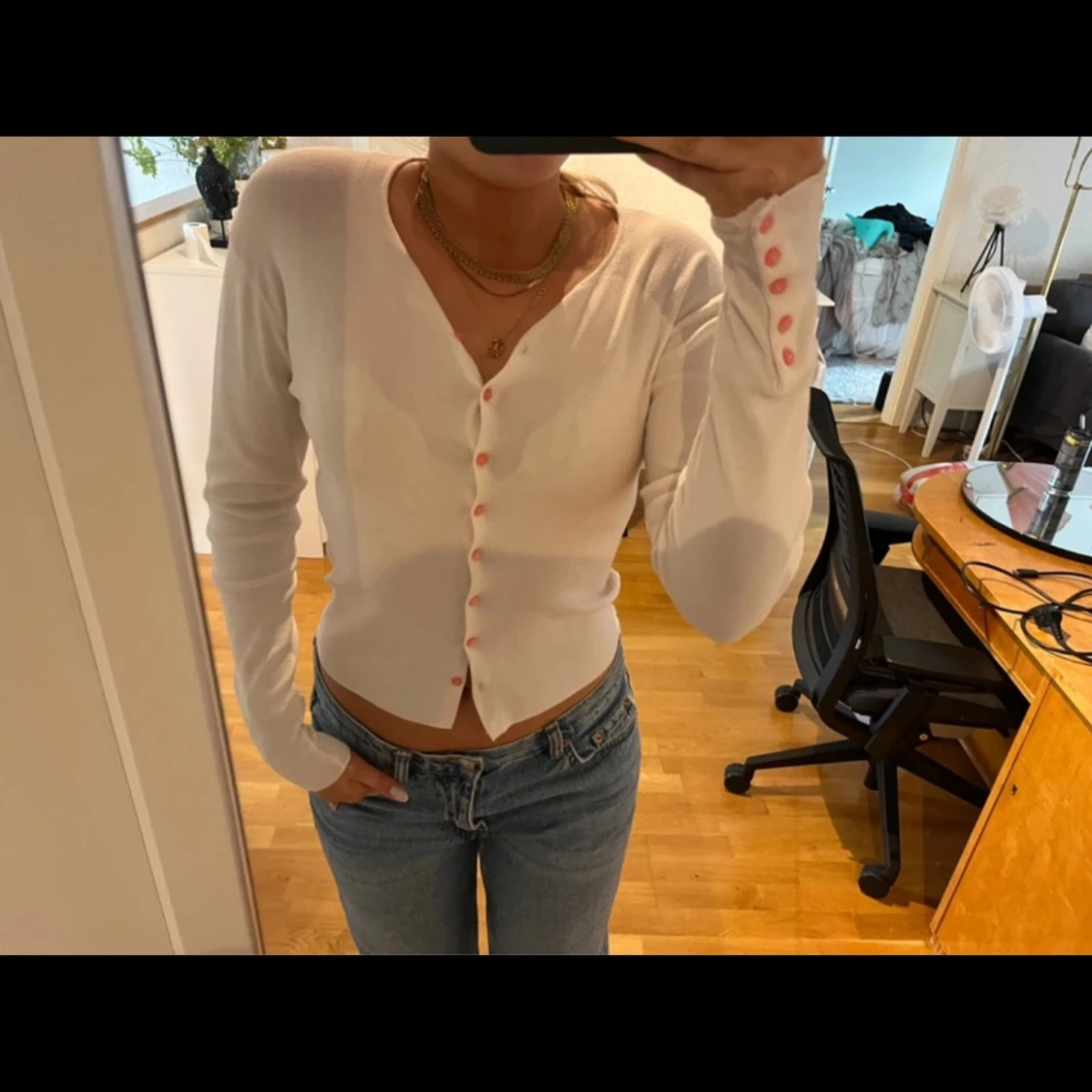 Rosa kofta med knappar