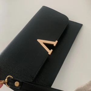 Handväska - En svart väska 