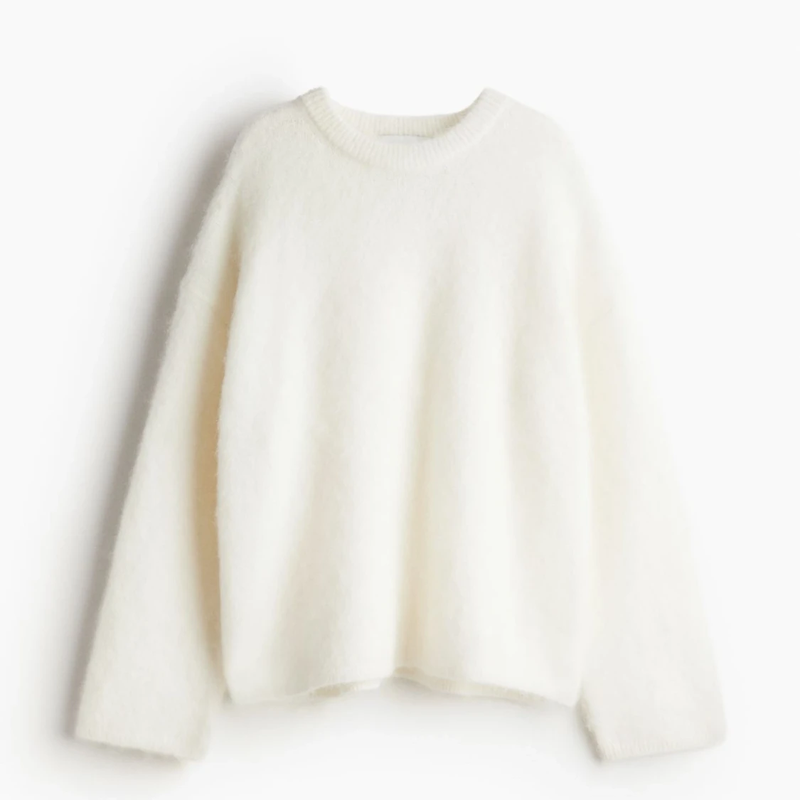 Vit mohair stickad tröja