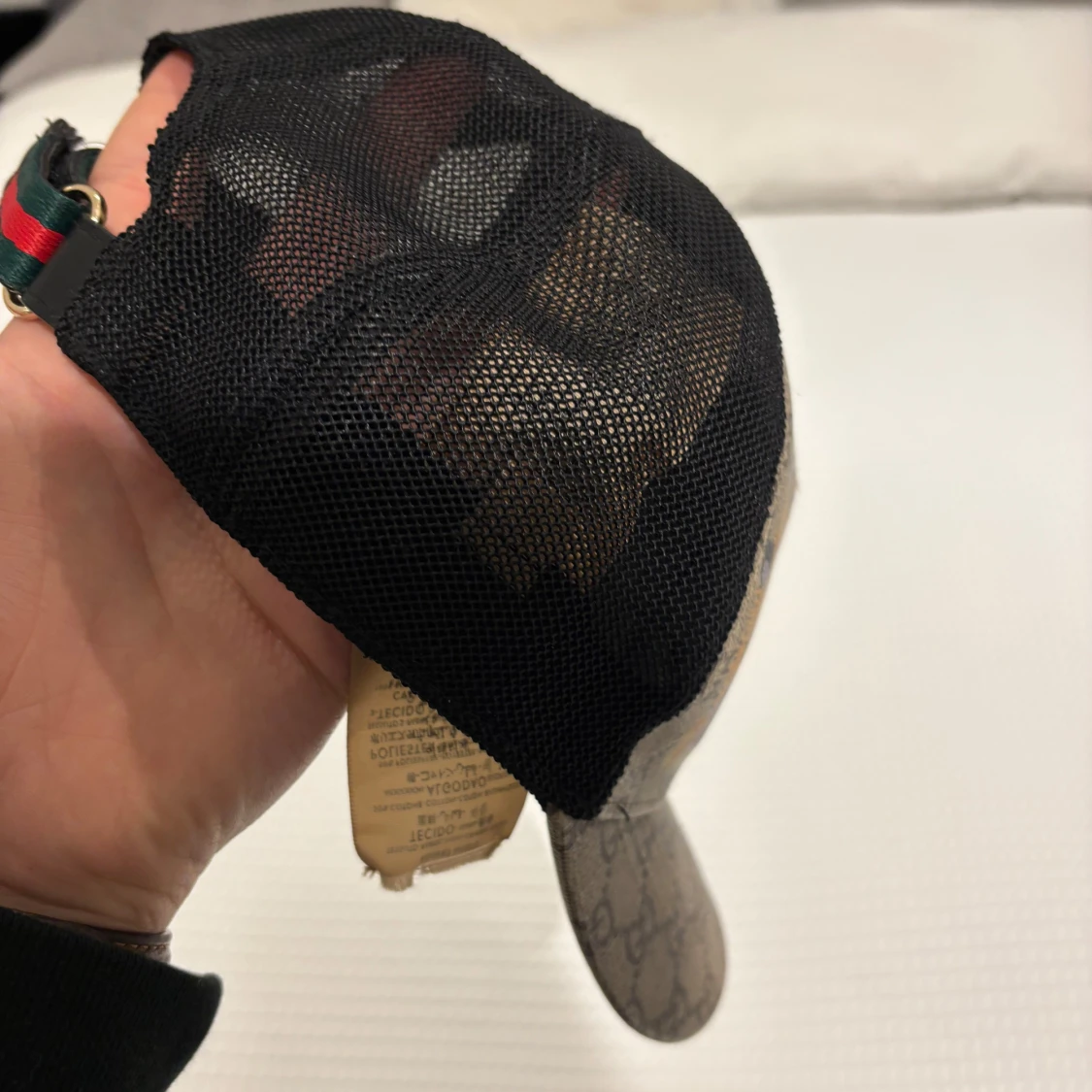 Mönstrad keps med tigerbroderi - 90