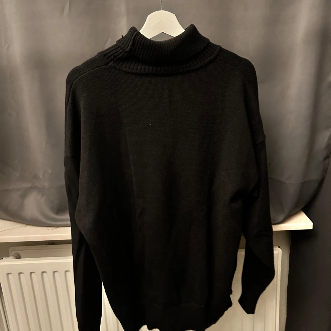 Svart polotröja från Ami - 90