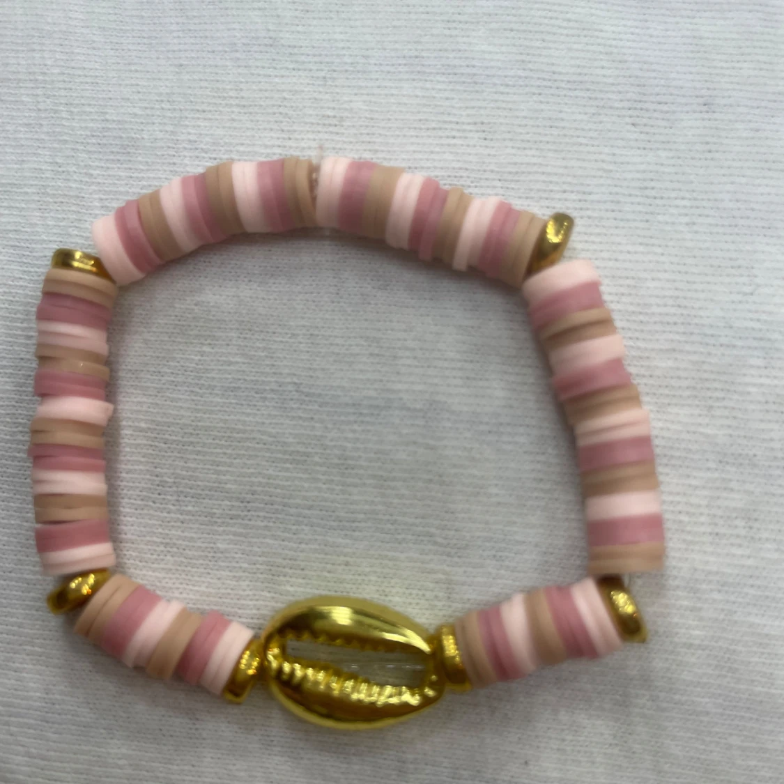  rosa armband med snäckdetalj - 90