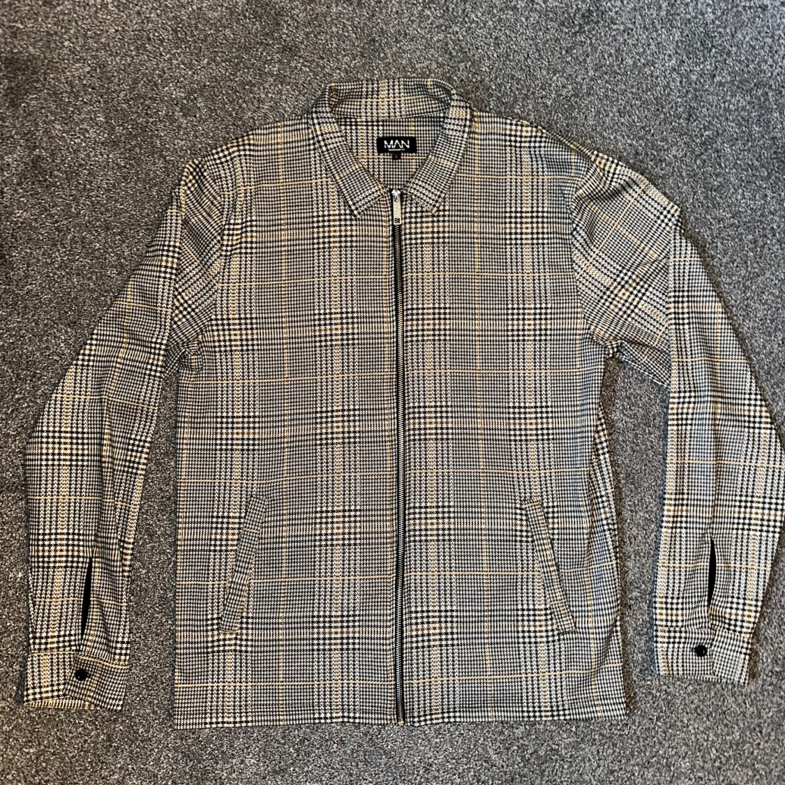 Rutig jacka från MAN