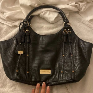 Shoulder bag - never used, xl in size, fits laptop and books