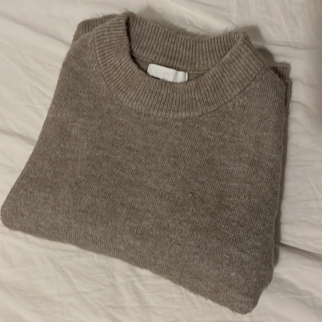 Beige stickad tröja - 90