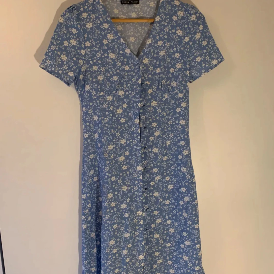 Blå blommig klänning från Zara