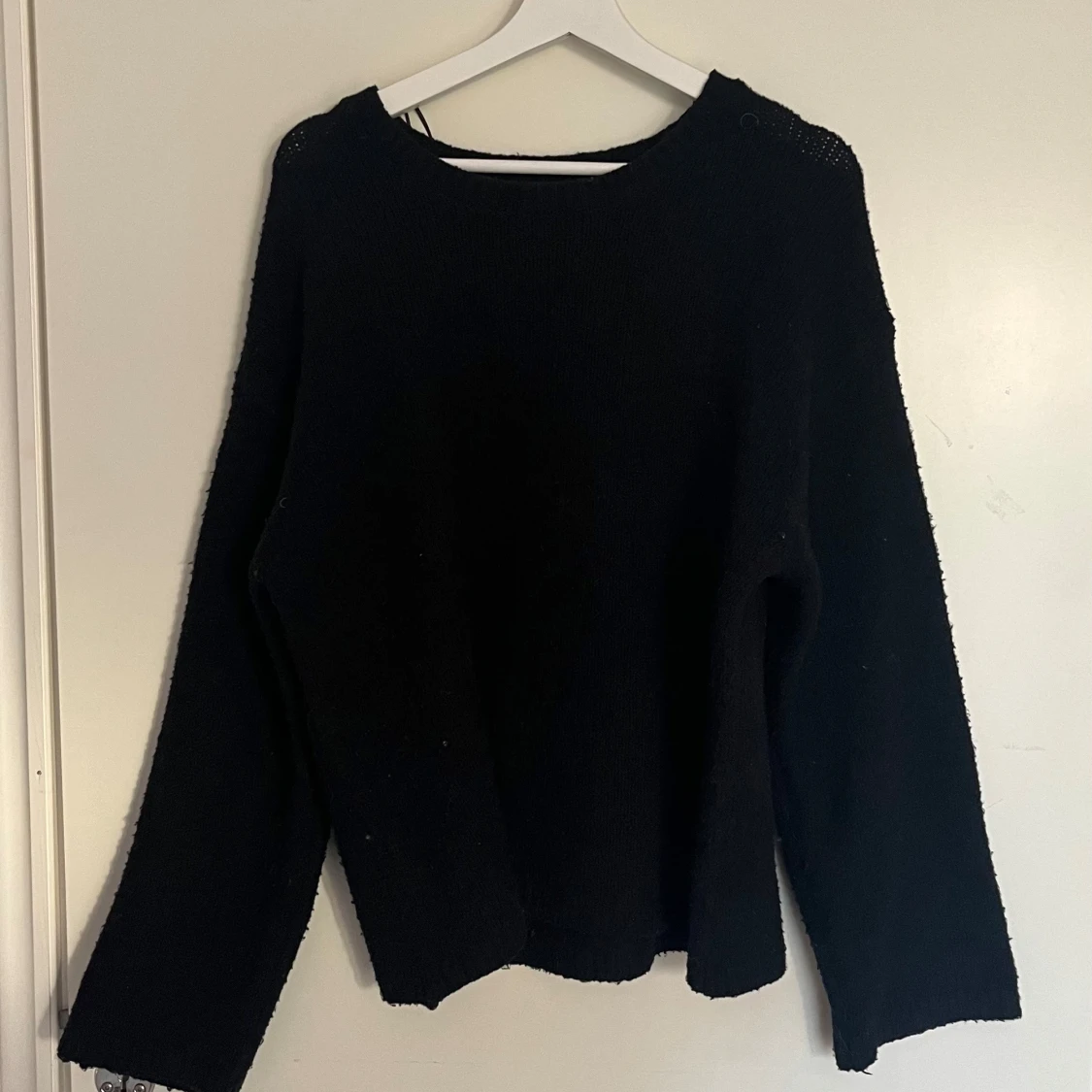 Svart stickad tröja