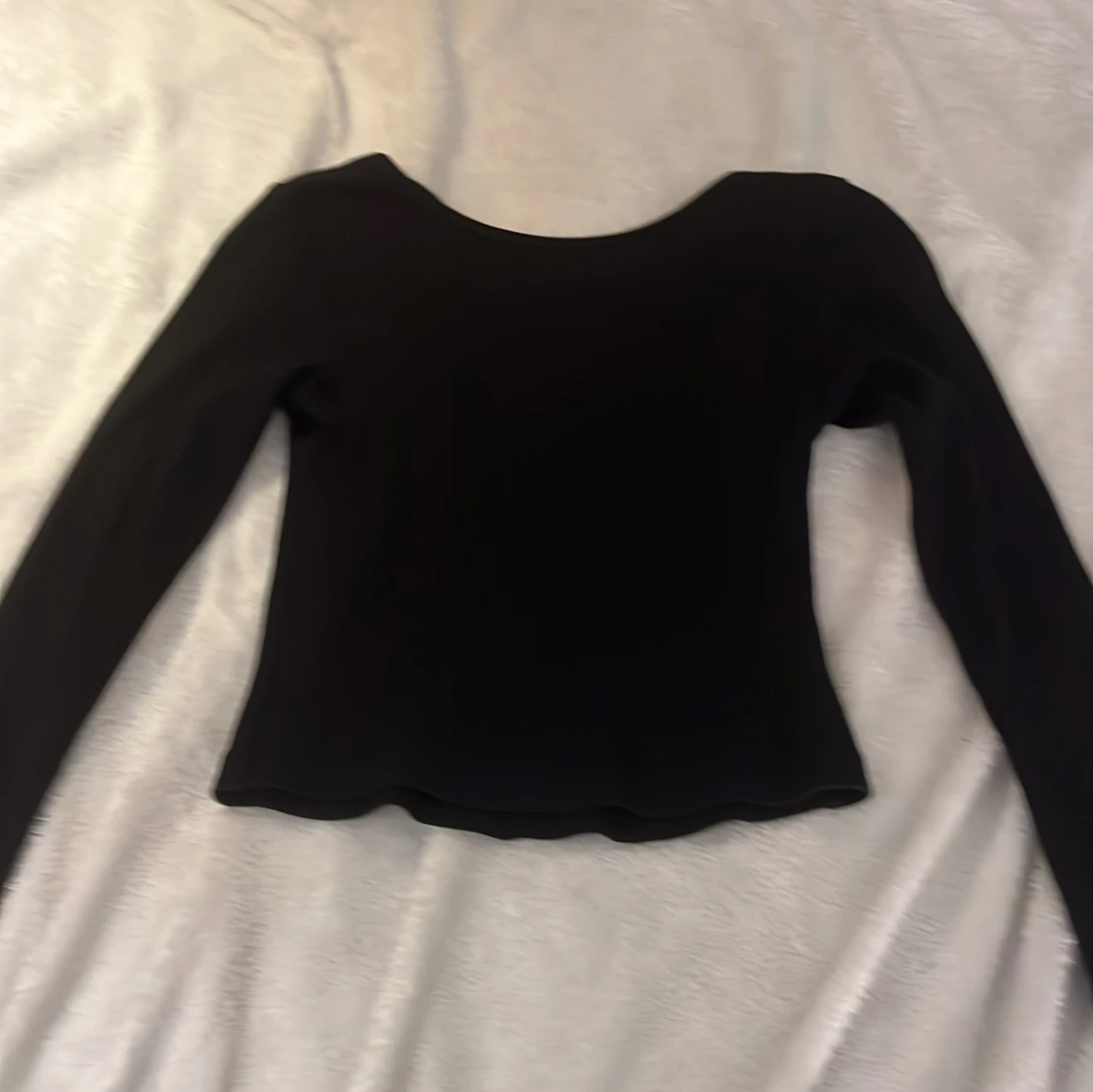 Svart långärmad topp från KappAhl