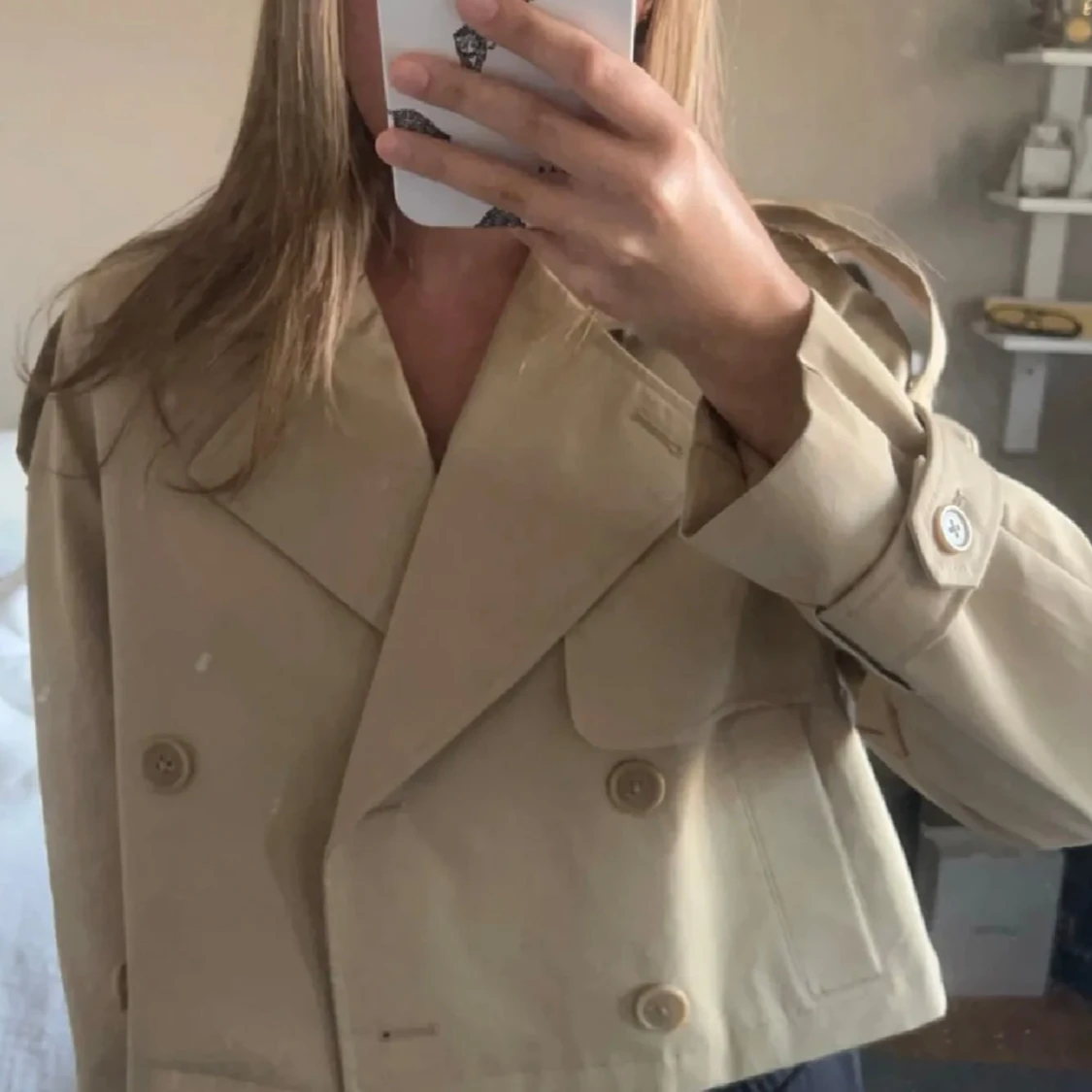 beige trench coat