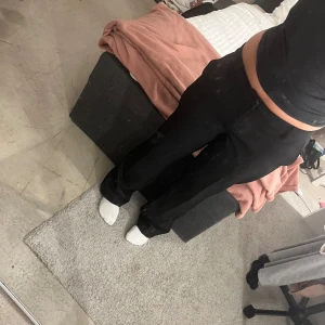 kostymbyxor - lågmidjade kostymbyxor som använts någon gång