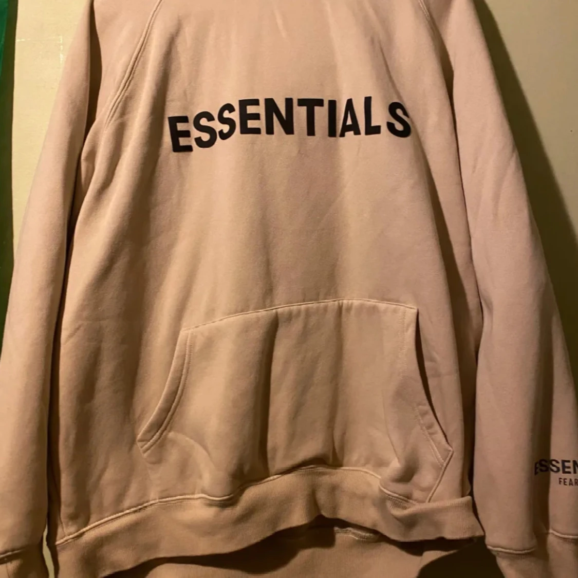 Beige Essentials hoodie