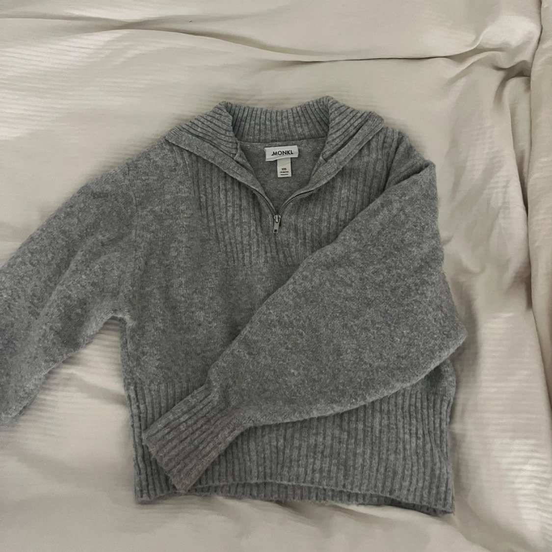 Grå stickad half zipup 