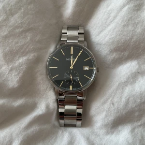 Morris klocka  - Morris klocka , (batteriet är slut). Ca 18-19cm runt handleden. 