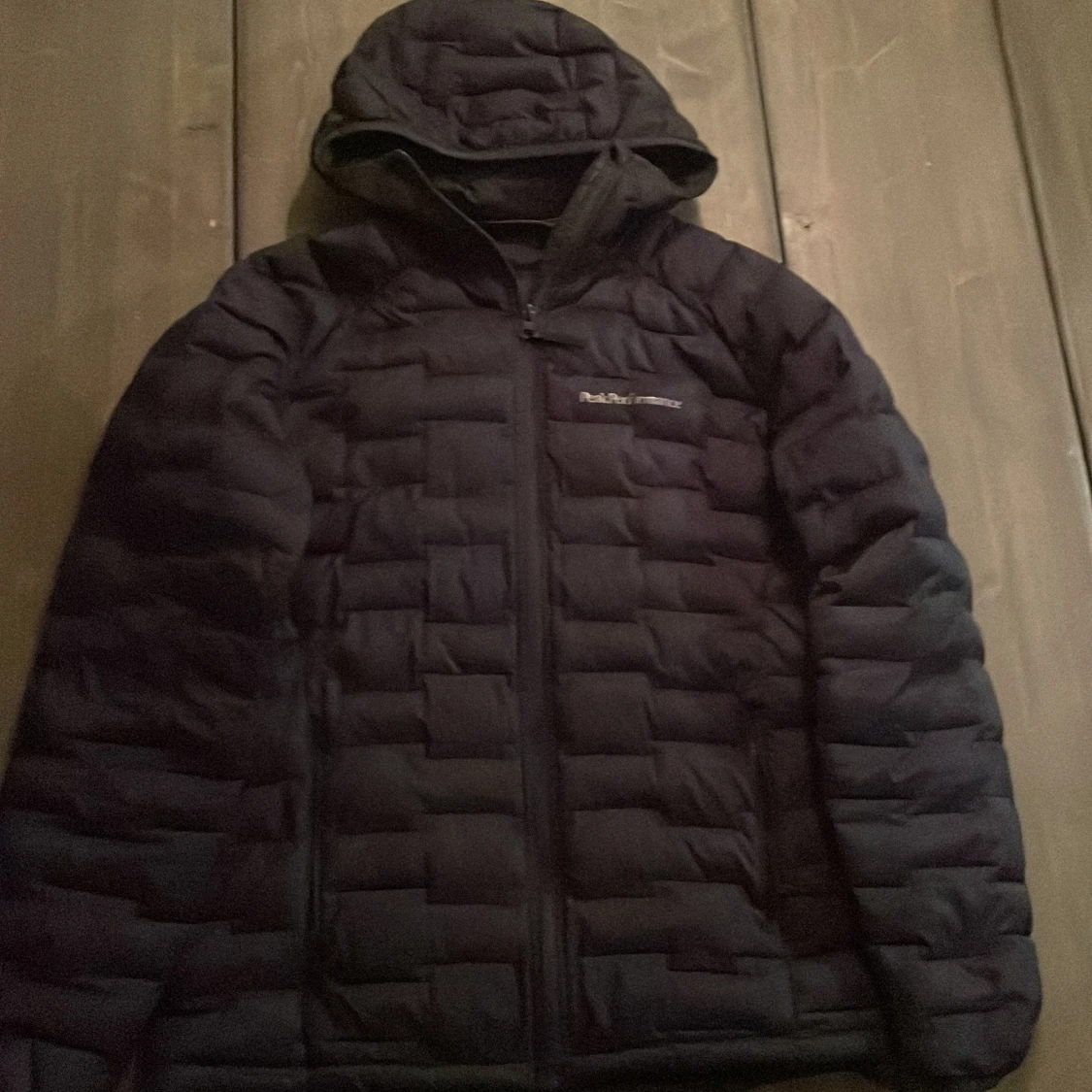 Mörkblå Peak Performance jacka