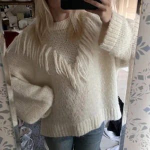 Stickad tröja - Snygg tröja från other stories, själv aldrig använt. Köpt från plick 