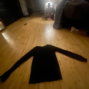 Långärmat  - Långärmad tröja färg svart storlek 158/164