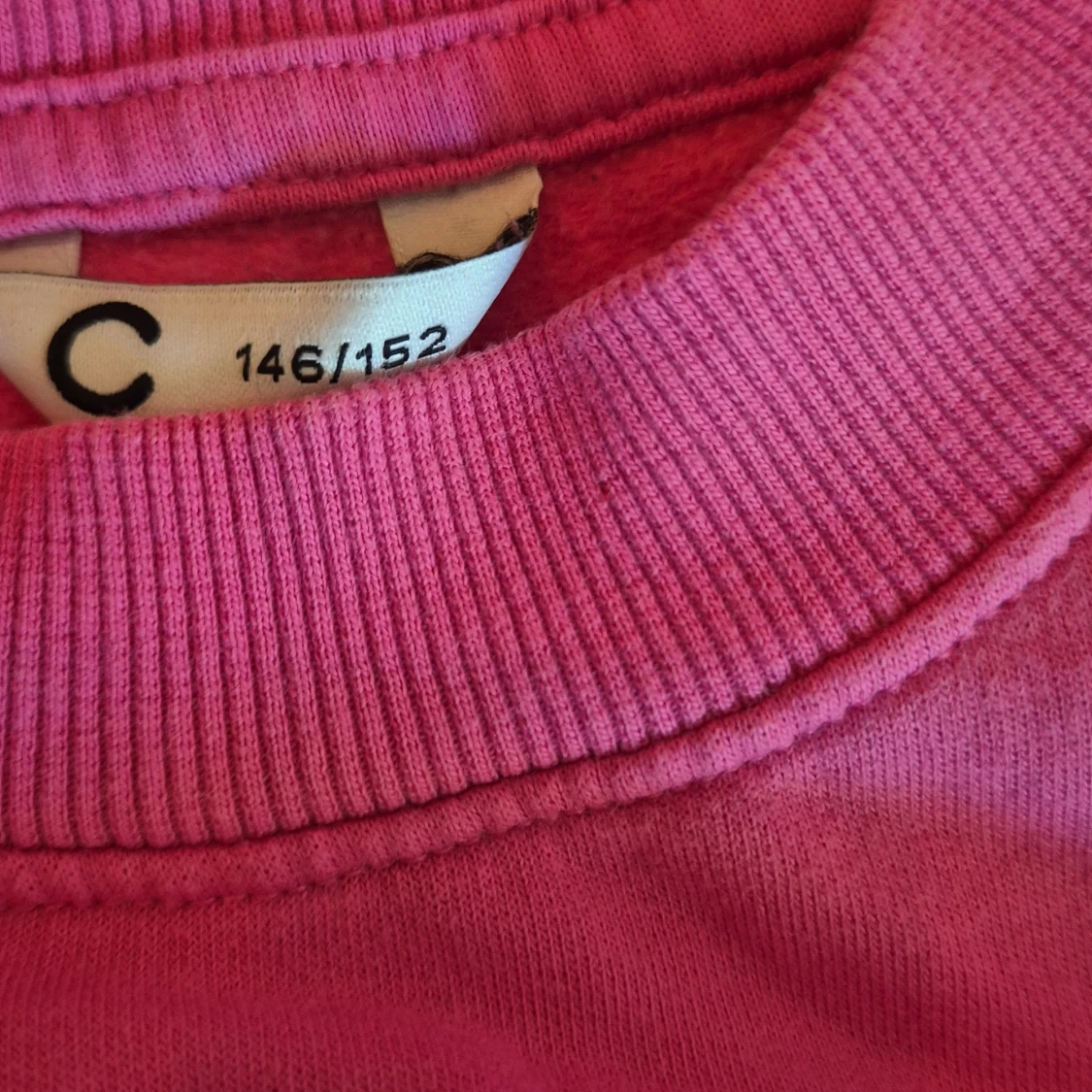 Rosa tröja med blomtryck - 90