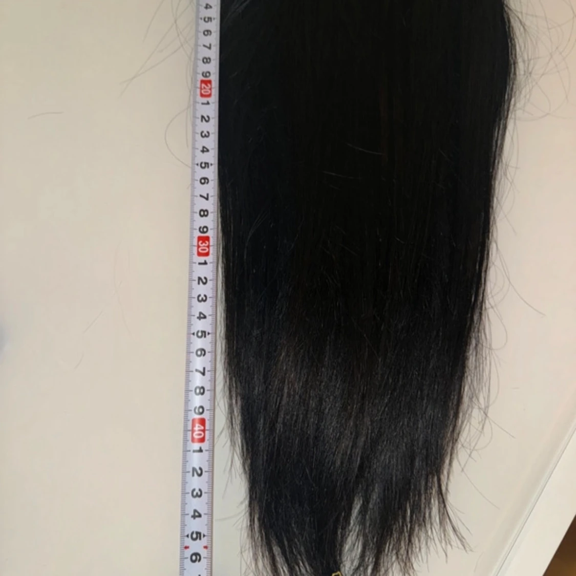 Äkta clips Svart löshår från Poze - 1