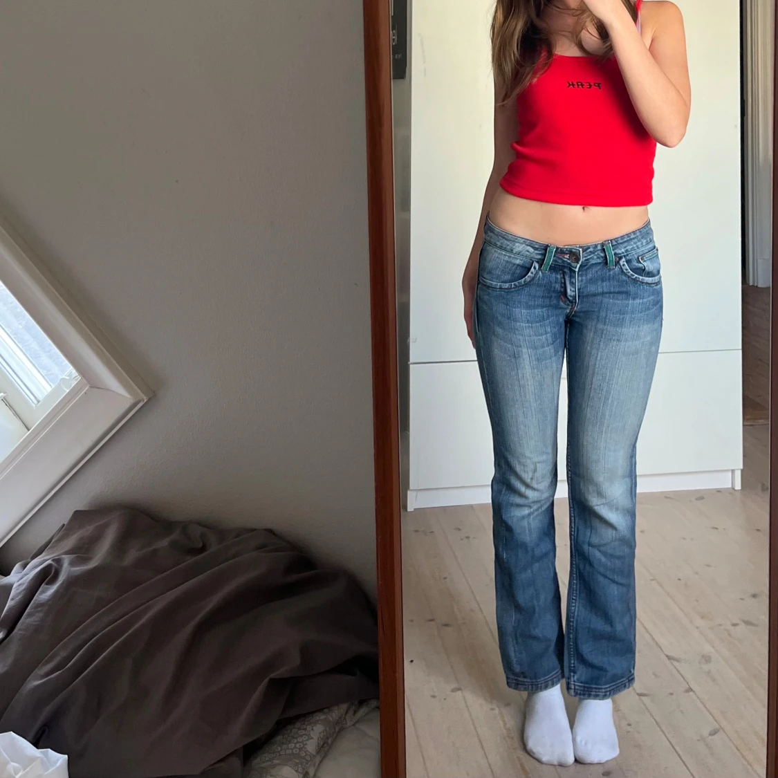 Vintage jeans med detalj på fickor - 1