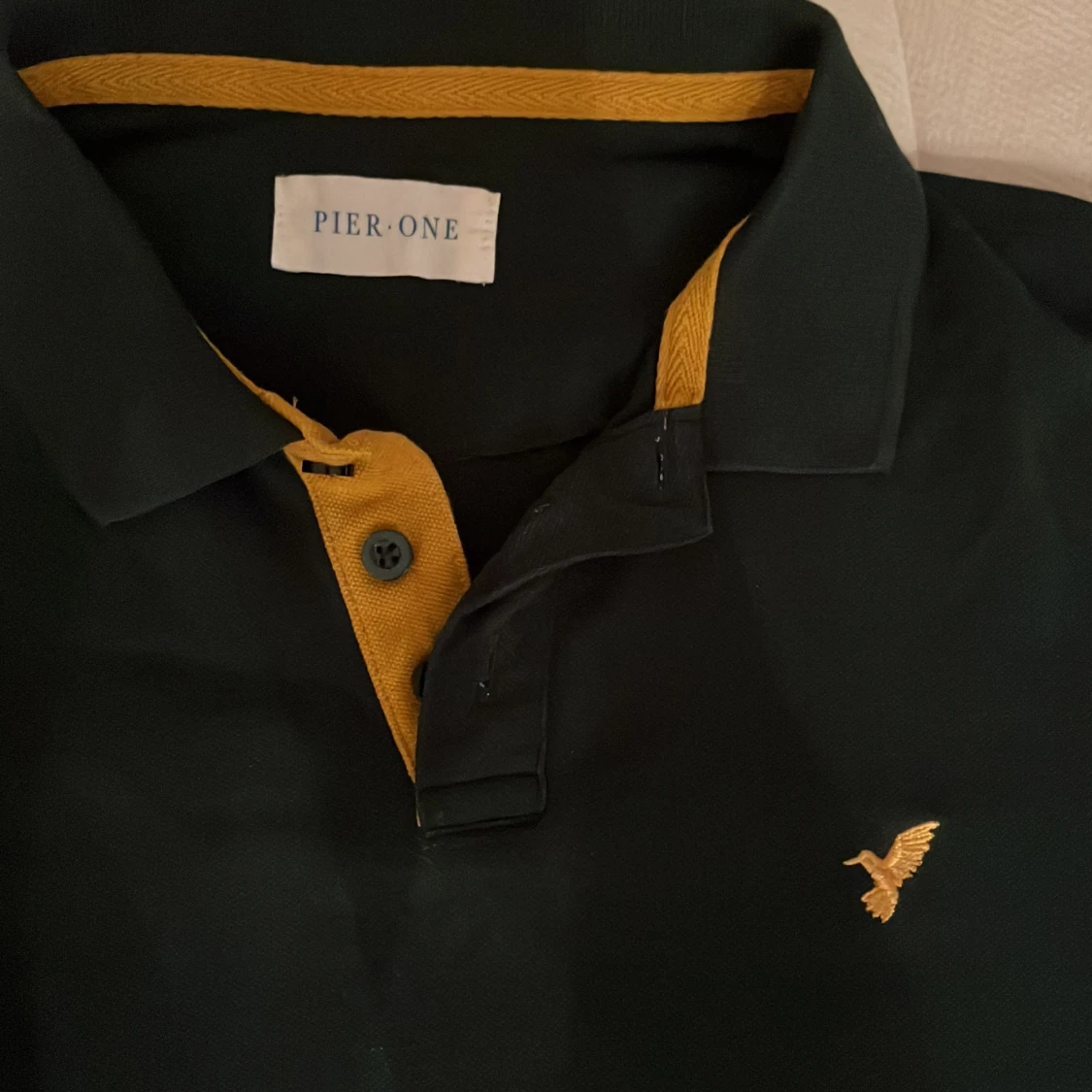 Grön pikétröja från Pier One - 91