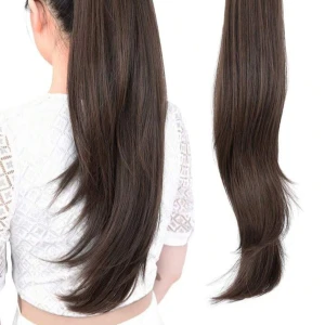 Brun hästsvans hårförlängning ponytail - Jättefin ponytail från Shein som fästs med en hårklämma. Säljs pga fel hårfärg för mig som har en kall ton. Har du en varm brun ton så kommer den att passa dig perfekt. Helt oanvänd!