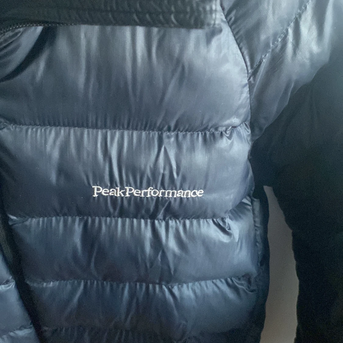 Svart dunjacka från Peak Performance - 91