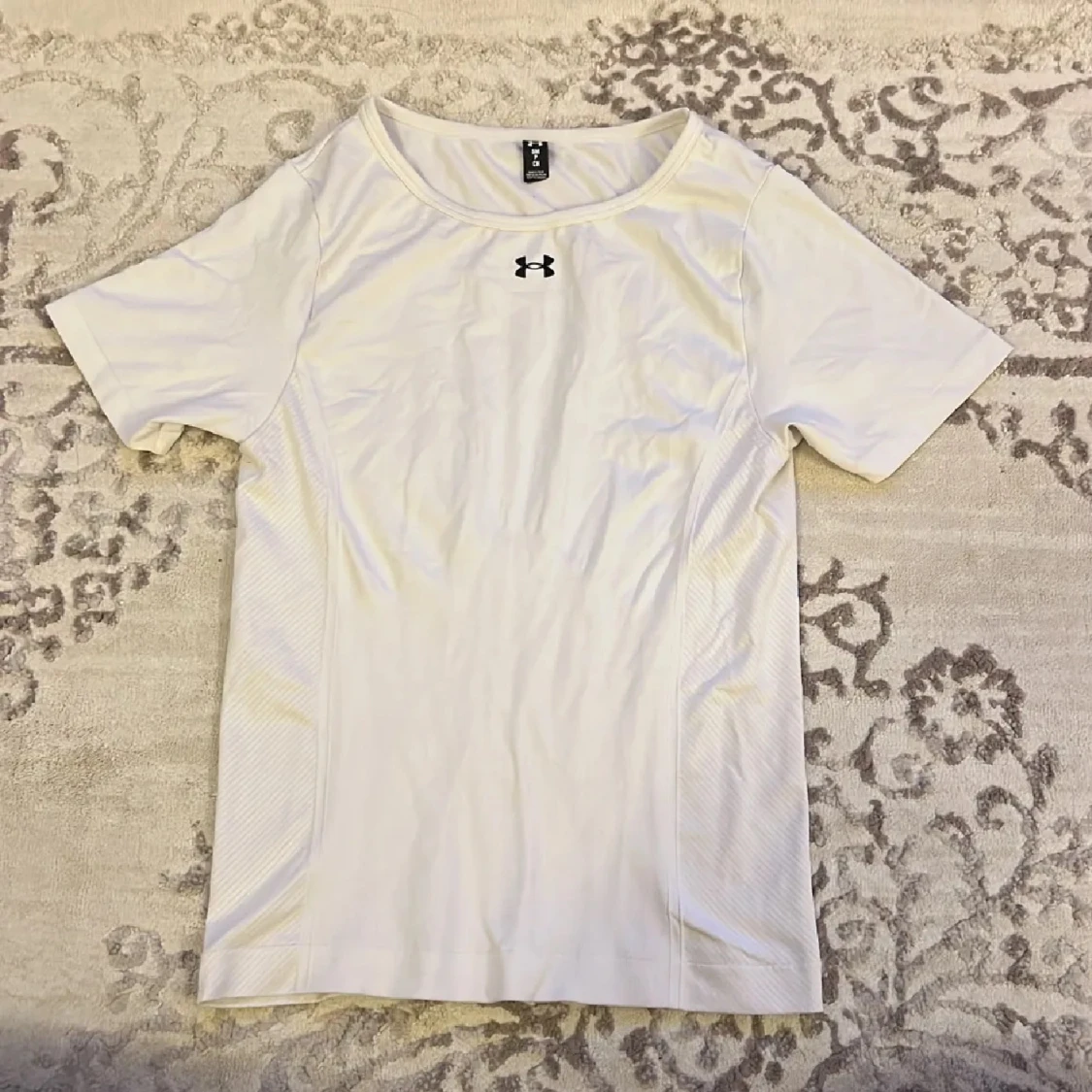Under Armour t-shirts i svart och vit