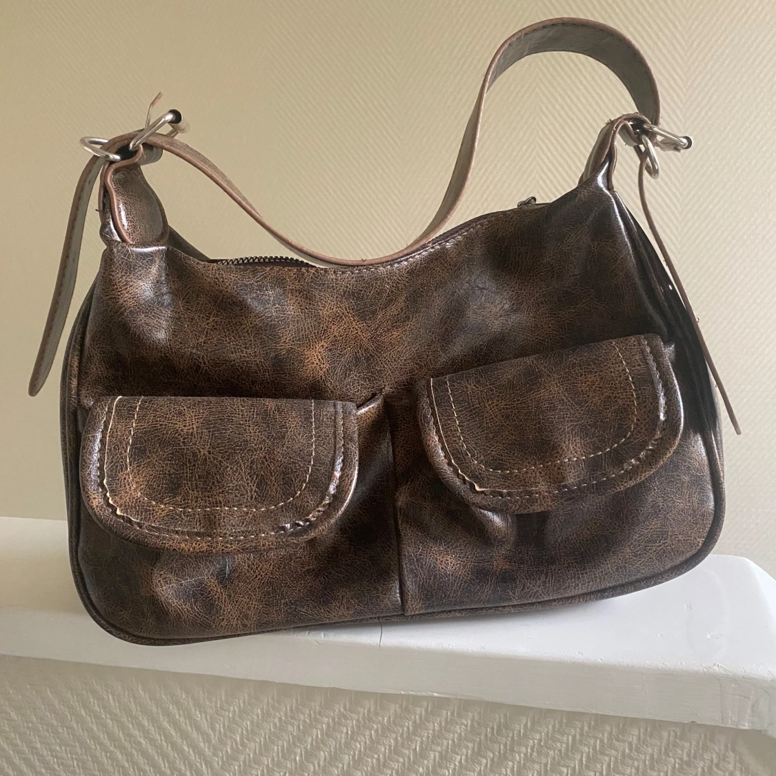 Brun axelväska i skinn