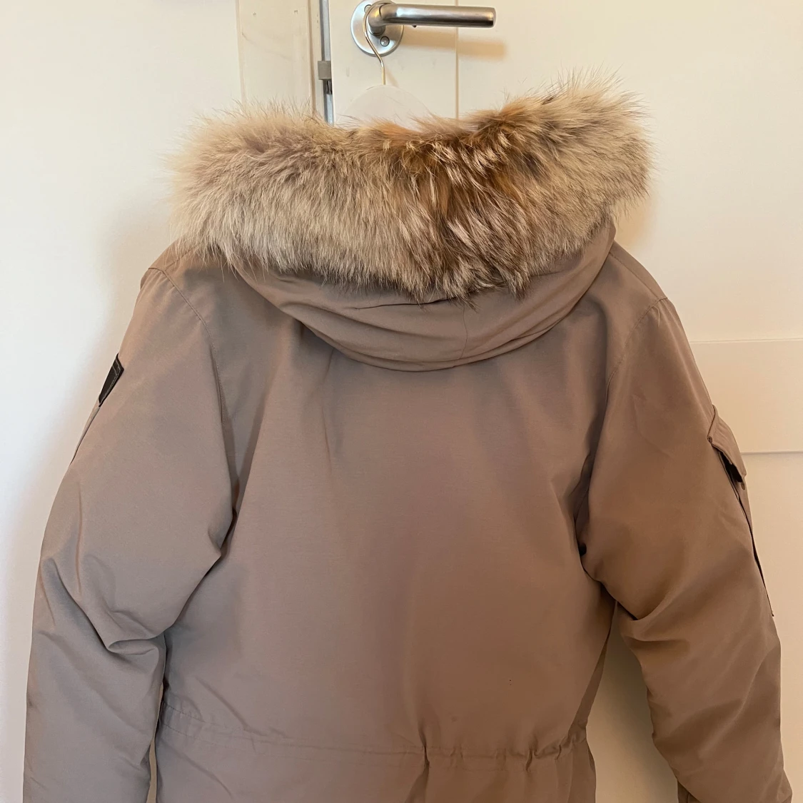 Beige vinterjacka från Canada Goose - 90