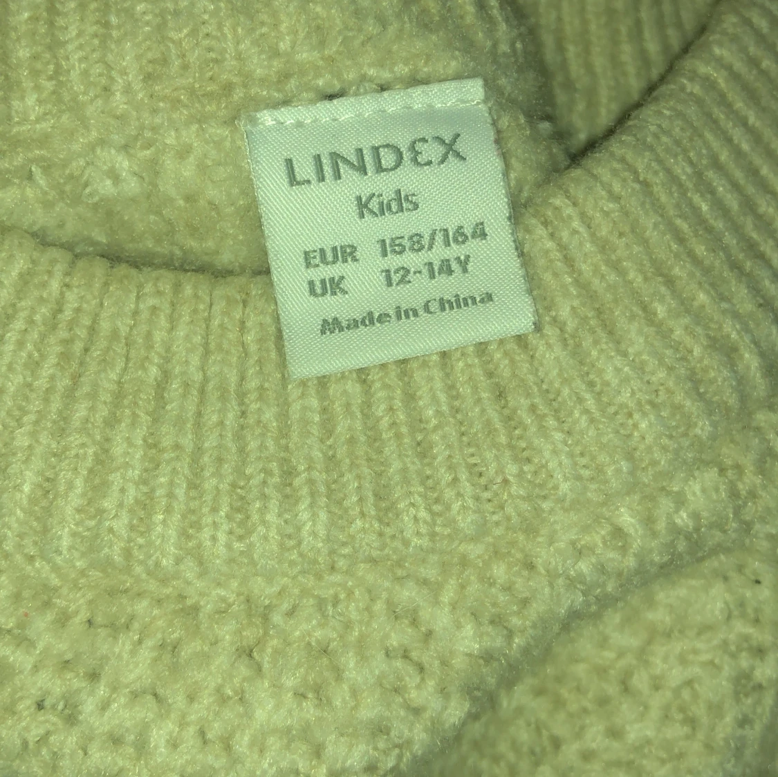 Beige stickad tröja från Lindex Kids - 90