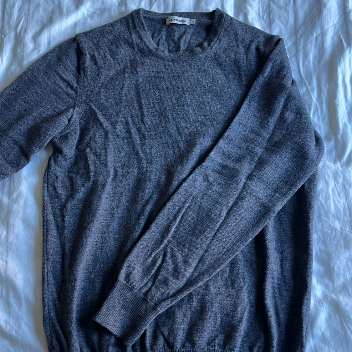 J.Lindberg merino ull tröja 