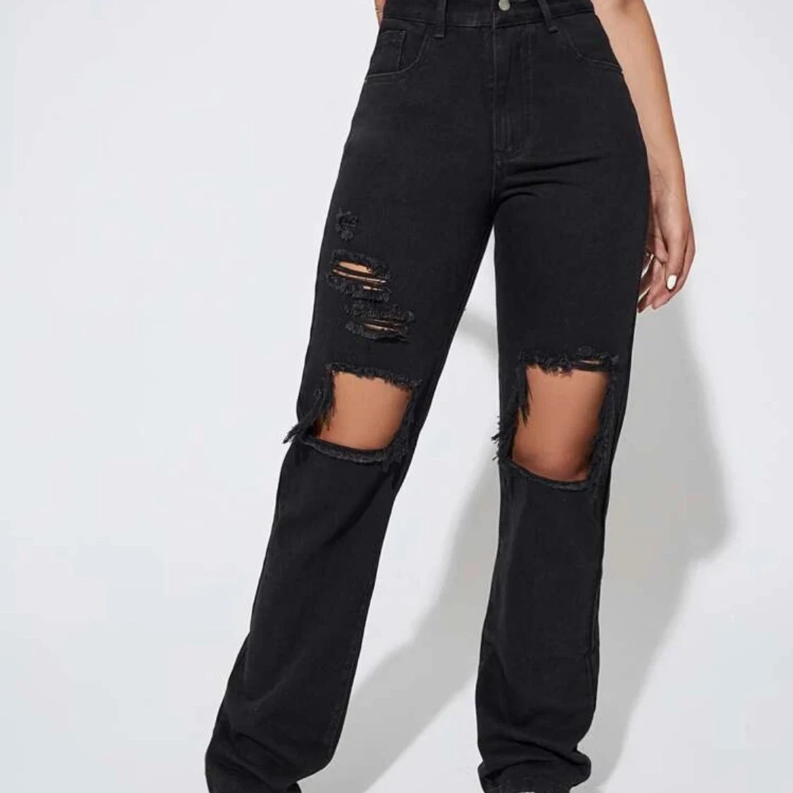 Svarta slitna jeans  - 91