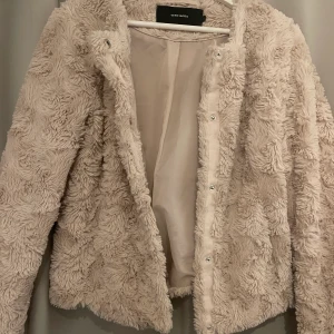 Fluff jacka  - Fin jacka som används få tal gånger 