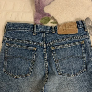 Jeans - Jeans med baggy passform och midwaist. 