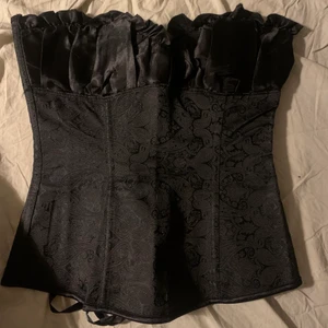 Korsett - Kattig