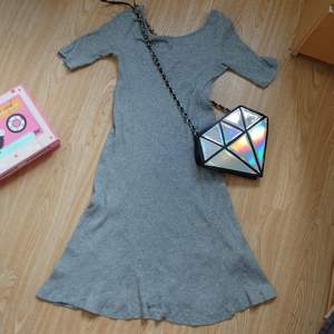 short gray fabric dress, very comfortable. Size xs. Back have little v-shape