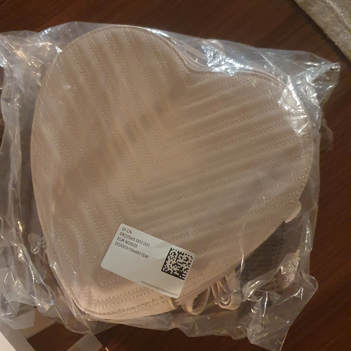 Rosa hjärtformad ryggsäck