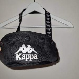 Kappa waist bag size S, black and white. Used but no damage