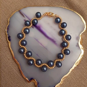 Handgjort pärlarmband - Pärlarmband som jag gjort själv. 20,5cm