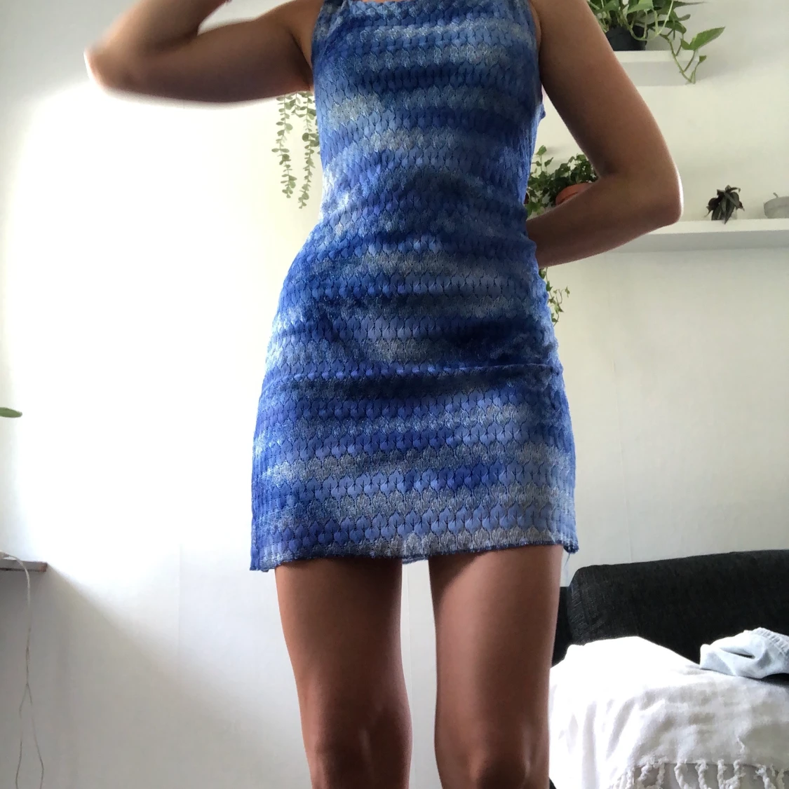 Glimrande blå miniklänning