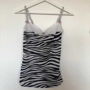 Dolce & Gabbana linne i zebra - Stretchig Dolce & Gabbana linne i zebra med justerbara band! 