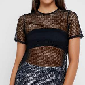 Fishnet T-shirt nyskick. Säljer då jag aldrig använder