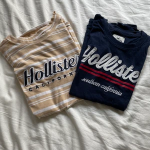  Hollister t-shirts  - Säljer mina fina hollister t-shirts!!de är i toppen skick och är knappt använda. Går att köpa var för sig 70kr-styck. Den marinblåa tröjan är i storlek xs och den randiga i S.