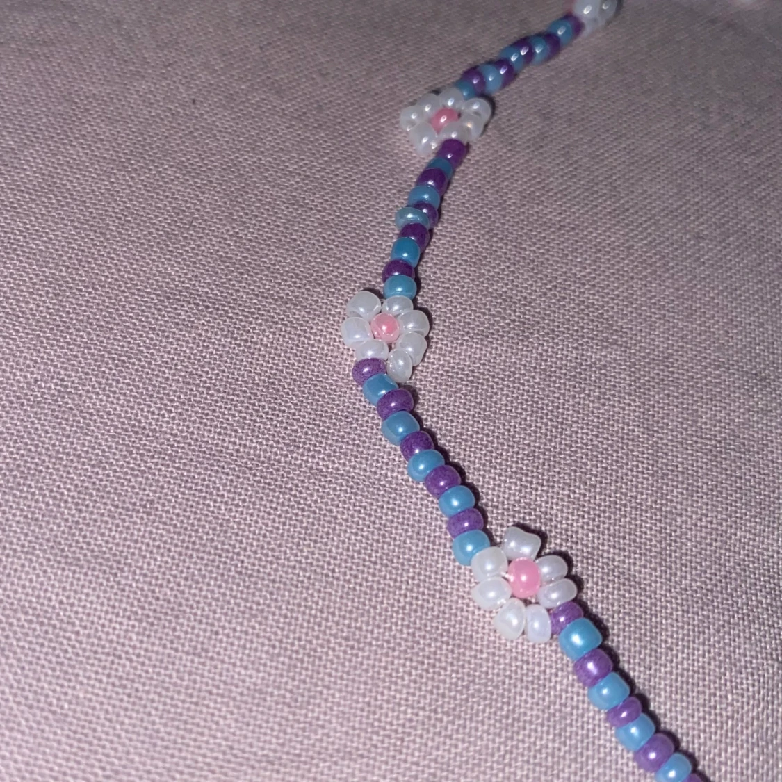 Blommigt pärlhalsband  - 90