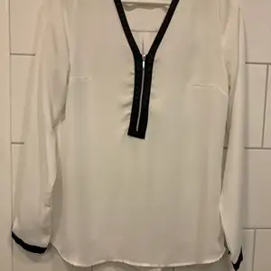  White shirt with black leather 